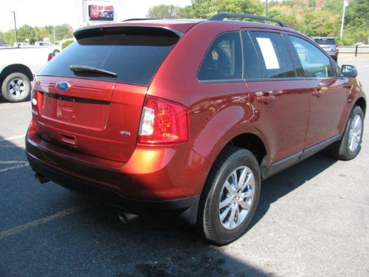 2014 Red Ford Edge SEL FWD (2FMDK3JCXEB) with an 3.5L V6 DOHC 24V engine, 6-Speed Automatic transmission, located at 2443 Albert Pike, Hot Springs, AR, 71913, (501) 623-6255, 34.492222, -93.109993 - Photo#2