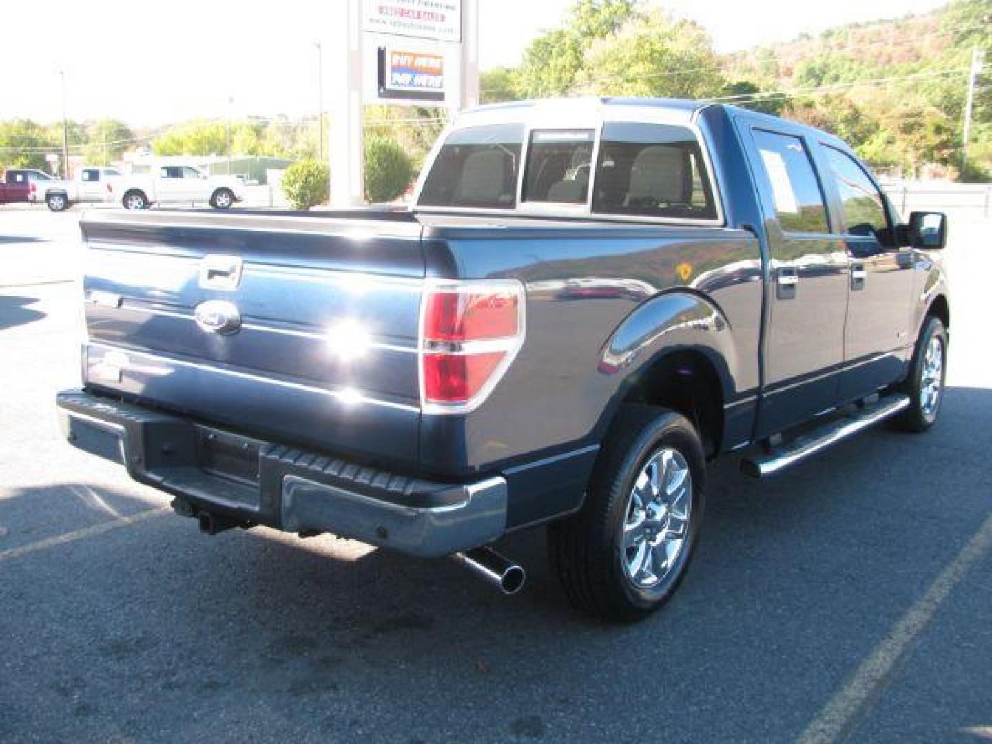 2014 Blue Ford F-150 XLT SuperCrew 5.5-ft. Bed 2WD (1FTFW1CT8EK) with an 3.5L V6 TURBO engine, 6-Speed Automatic transmission, located at 2443 Albert Pike, Hot Springs, AR, 71913, (501) 623-6255, 34.492222, -93.109993 - Photo#4