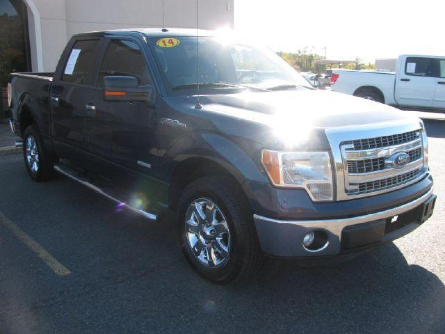 2014 Blue Ford F-150 XLT SuperCrew 5.5-ft. Bed 2WD (1FTFW1CT8EK) with an 3.5L V6 TURBO engine, 6-Speed Automatic transmission, located at 2443 Albert Pike, Hot Springs, AR, 71913, (501) 623-6255, 34.492222, -93.109993 - Photo#6