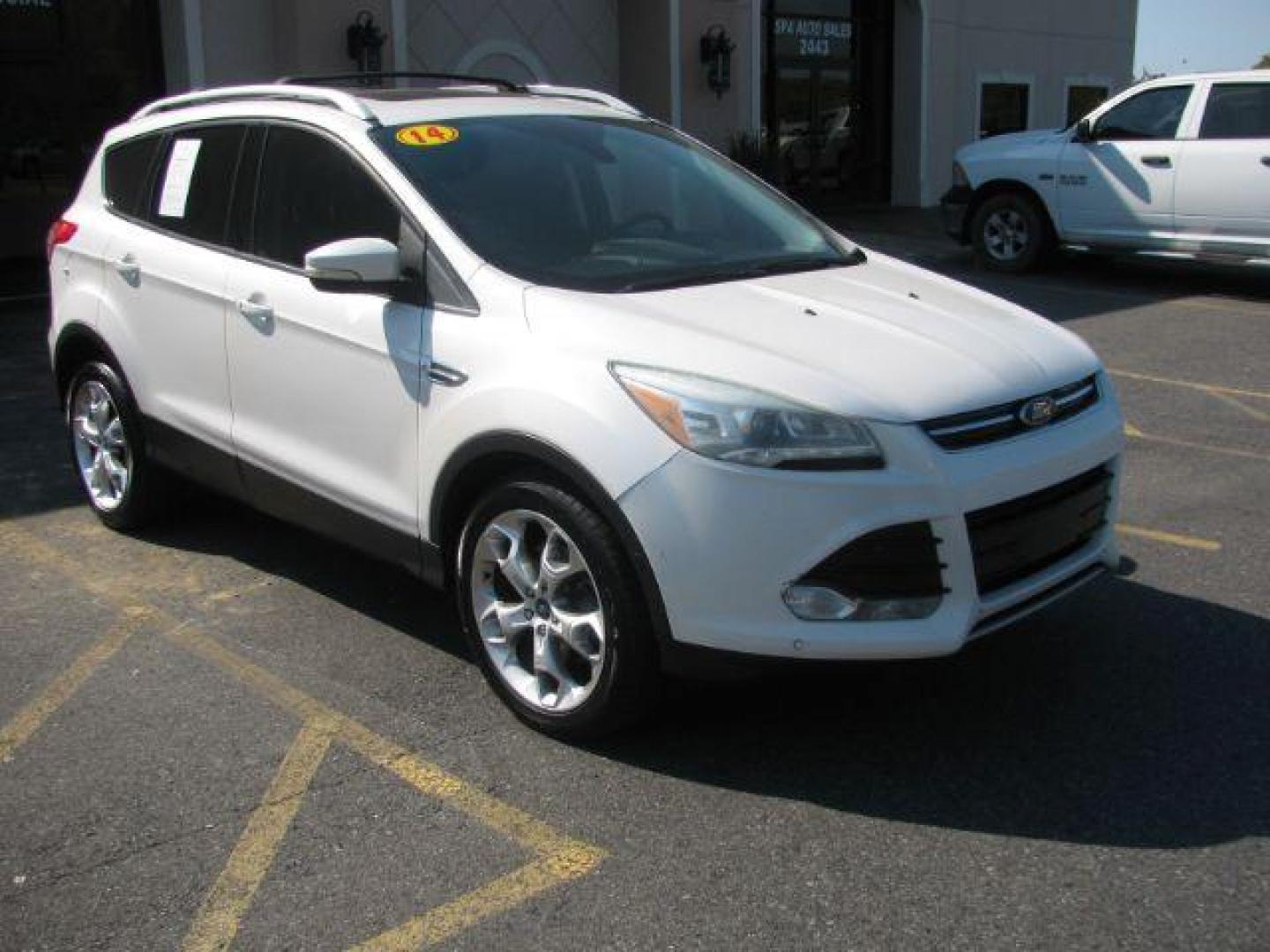 2014 White Ford Escape Titanium FWD (1FMCU0J96EU) with an 2.0L L4 DOHC 16V engine, 6-Speed Automatic transmission, located at 2443 Albert Pike, Hot Springs, AR, 71913, (501) 623-6255, 34.492222, -93.109993 - Photo#0