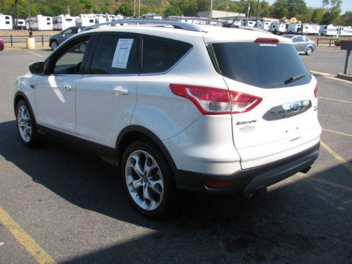 2014 White Ford Escape Titanium FWD (1FMCU0J96EU) with an 2.0L L4 DOHC 16V engine, 6-Speed Automatic transmission, located at 2443 Albert Pike, Hot Springs, AR, 71913, (501) 623-6255, 34.492222, -93.109993 - Photo#3