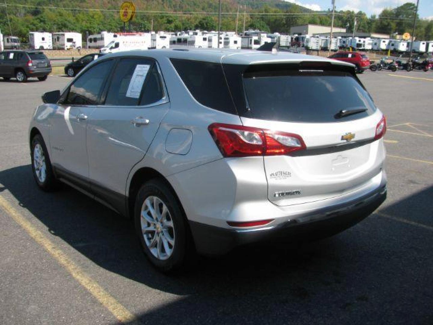 2019 Silver Chevrolet Equinox LT 1.5 2WD (2GNAXKEV2K6) with an 1.5L L4 DIR DOHC 16V TURBO engine, 6-Speed Automatic transmission, located at 2443 Albert Pike, Hot Springs, AR, 71913, (501) 623-6255, 34.492222, -93.109993 - Photo#3