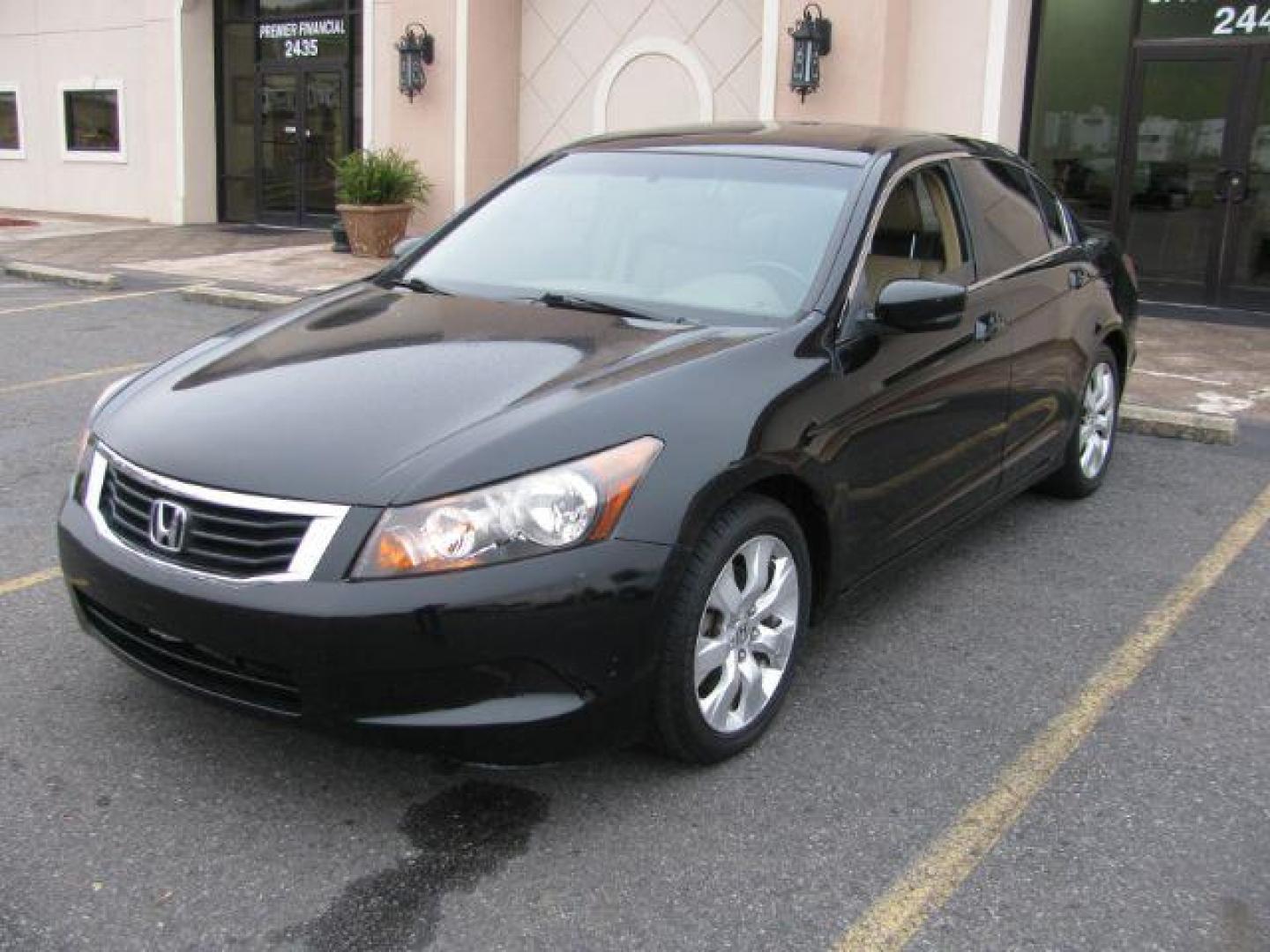 2008 Black Honda Accord EX-L Sedan AT (JHMCP26818C) with an 2.4L L4 DOHC 16V engine, 5-Speed Automatic transmission, located at 2443 Albert Pike, Hot Springs, AR, 71913, (501) 623-6255, 34.492222, -93.109993 - Photo#0