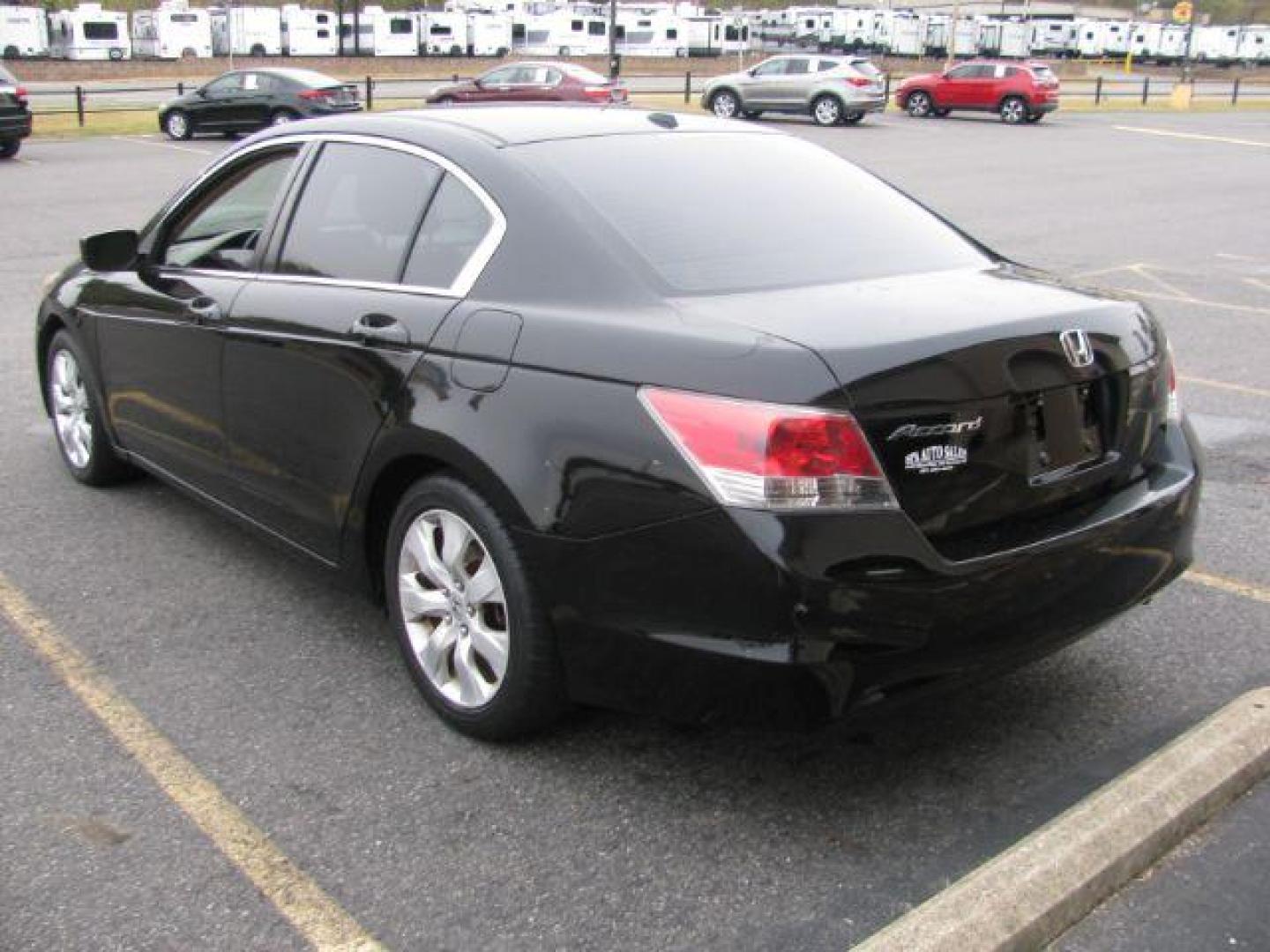 2008 Black Honda Accord EX-L Sedan AT (JHMCP26818C) with an 2.4L L4 DOHC 16V engine, 5-Speed Automatic transmission, located at 2443 Albert Pike, Hot Springs, AR, 71913, (501) 623-6255, 34.492222, -93.109993 - Photo#2