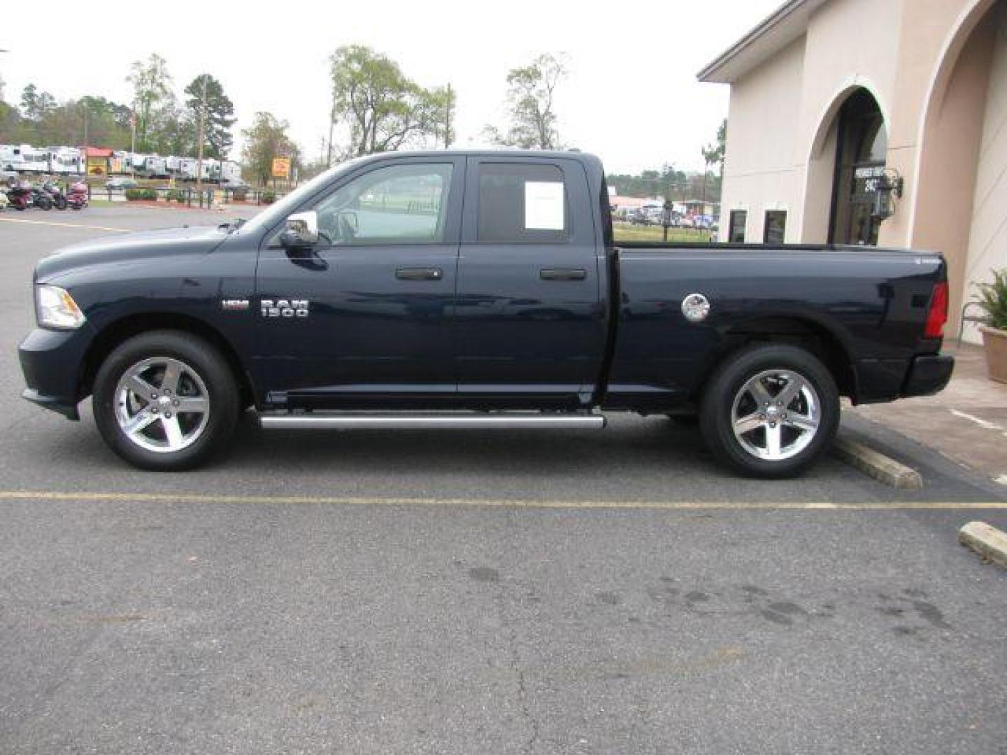 2013 Blue RAM 1500 Tradesman Quad Cab 2WD (1C6RR6FT7DS) with an 5.7L V8 OHV 16V engine, 6-Speed Automatic transmission, located at 2443 Albert Pike, Hot Springs, AR, 71913, (501) 623-6255, 34.492222, -93.109993 - Photo#1