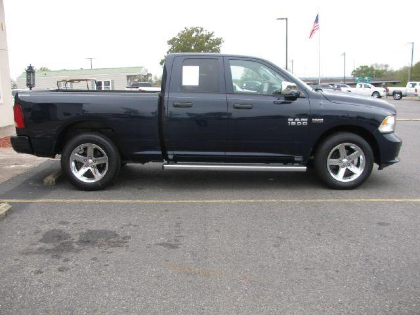 2013 Blue RAM 1500 Tradesman Quad Cab 2WD (1C6RR6FT7DS) with an 5.7L V8 OHV 16V engine, 6-Speed Automatic transmission, located at 2443 Albert Pike, Hot Springs, AR, 71913, (501) 623-6255, 34.492222, -93.109993 - Photo#5