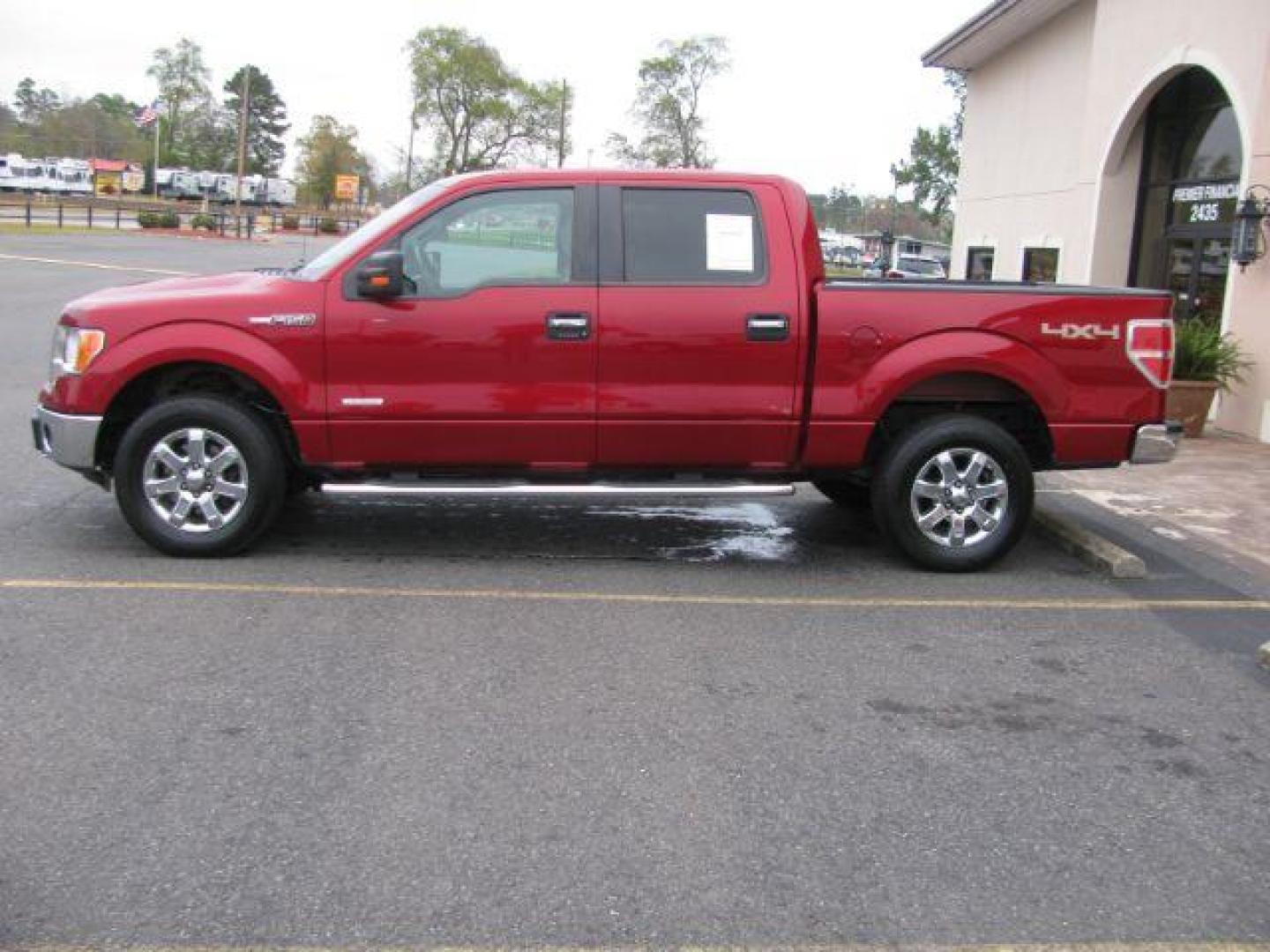 2013 Maroon Ford F-150 XLT SuperCrew 5.5-ft. Bed 4WD (1FTFW1ET3DK) with an 3.5L V6 TURBO engine, 6-Speed Automatic transmission, located at 2443 Albert Pike, Hot Springs, AR, 71913, (501) 623-6255, 34.492222, -93.109993 - Photo#1