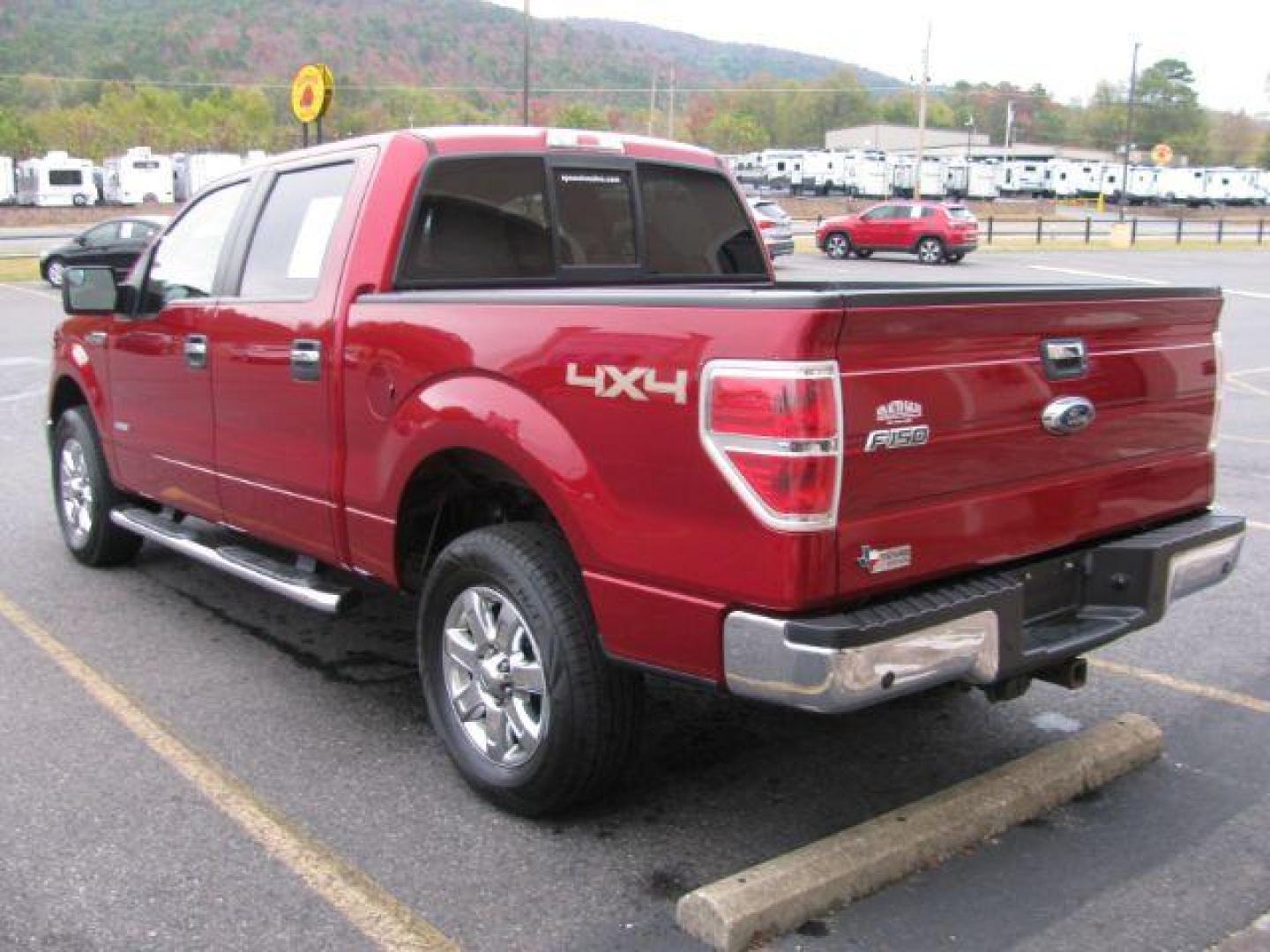 2013 Maroon Ford F-150 XLT SuperCrew 5.5-ft. Bed 4WD (1FTFW1ET3DK) with an 3.5L V6 TURBO engine, 6-Speed Automatic transmission, located at 2443 Albert Pike, Hot Springs, AR, 71913, (501) 623-6255, 34.492222, -93.109993 - Photo#2