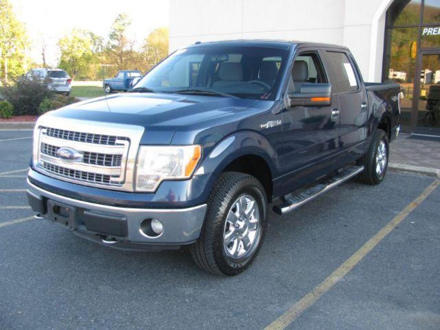 2013 Blue Ford F-150 XLT SuperCrew 5.5-ft. Bed 4WD (1FTFW1EF6DK) with an 5.0L V8 engine, 6-Speed Automatic transmission, located at 2443 Albert Pike, Hot Springs, AR, 71913, (501) 623-6255, 34.492222, -93.109993 - Photo#0