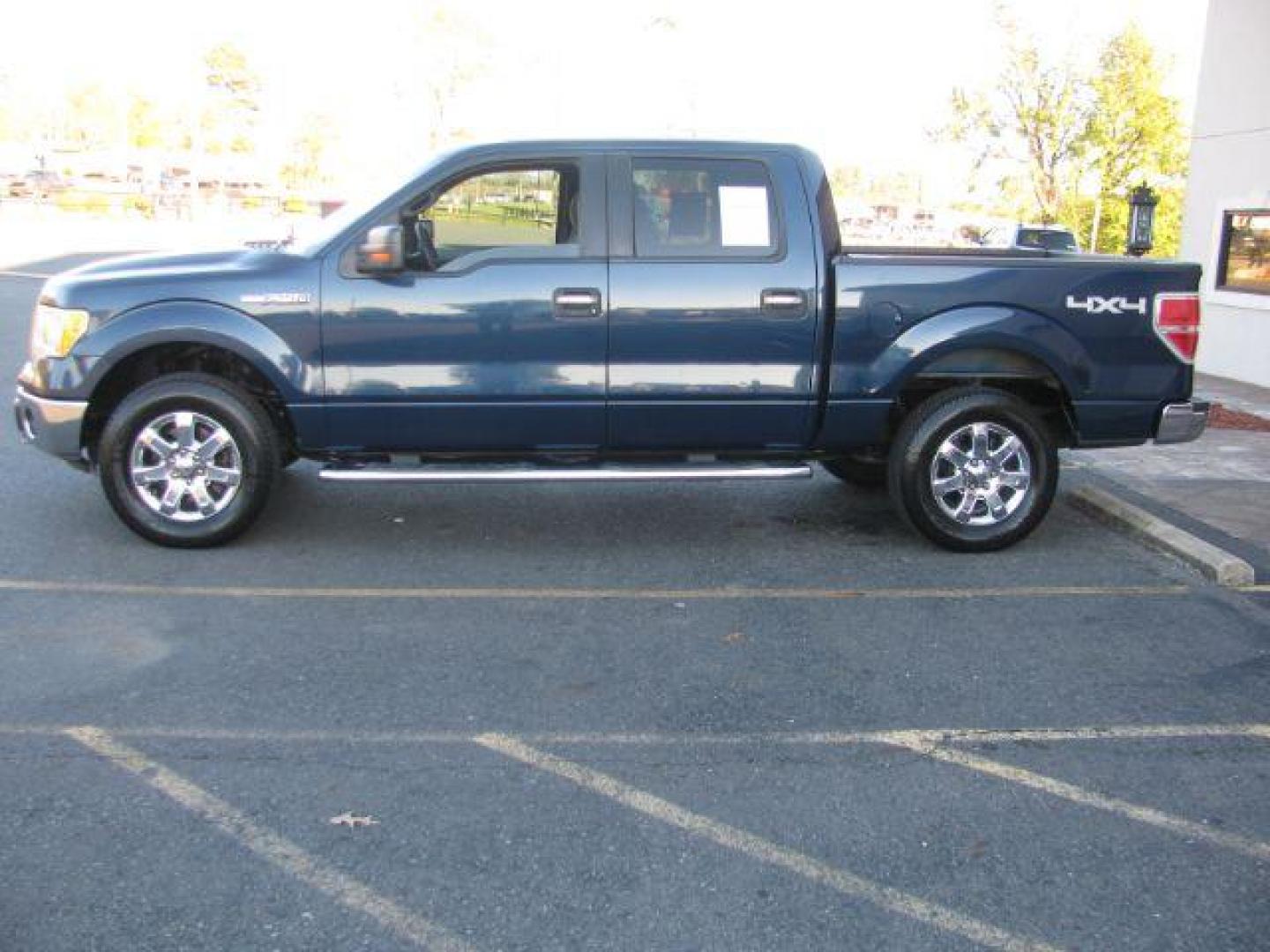 2013 Blue Ford F-150 XLT SuperCrew 5.5-ft. Bed 4WD (1FTFW1EF6DK) with an 5.0L V8 engine, 6-Speed Automatic transmission, located at 2443 Albert Pike, Hot Springs, AR, 71913, (501) 623-6255, 34.492222, -93.109993 - Photo#1