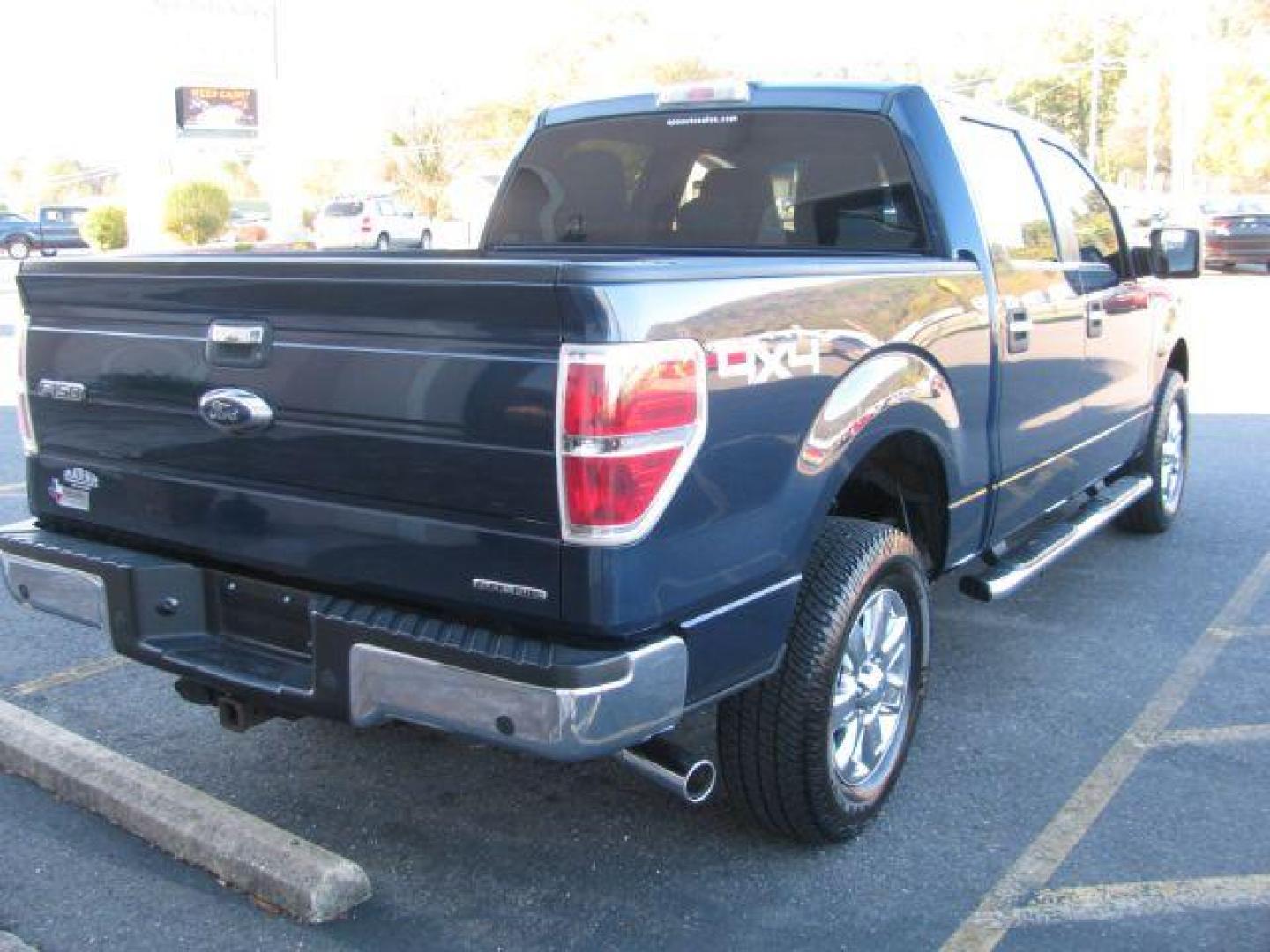 2013 Blue Ford F-150 XLT SuperCrew 5.5-ft. Bed 4WD (1FTFW1EF6DK) with an 5.0L V8 engine, 6-Speed Automatic transmission, located at 2443 Albert Pike, Hot Springs, AR, 71913, (501) 623-6255, 34.492222, -93.109993 - Photo#4