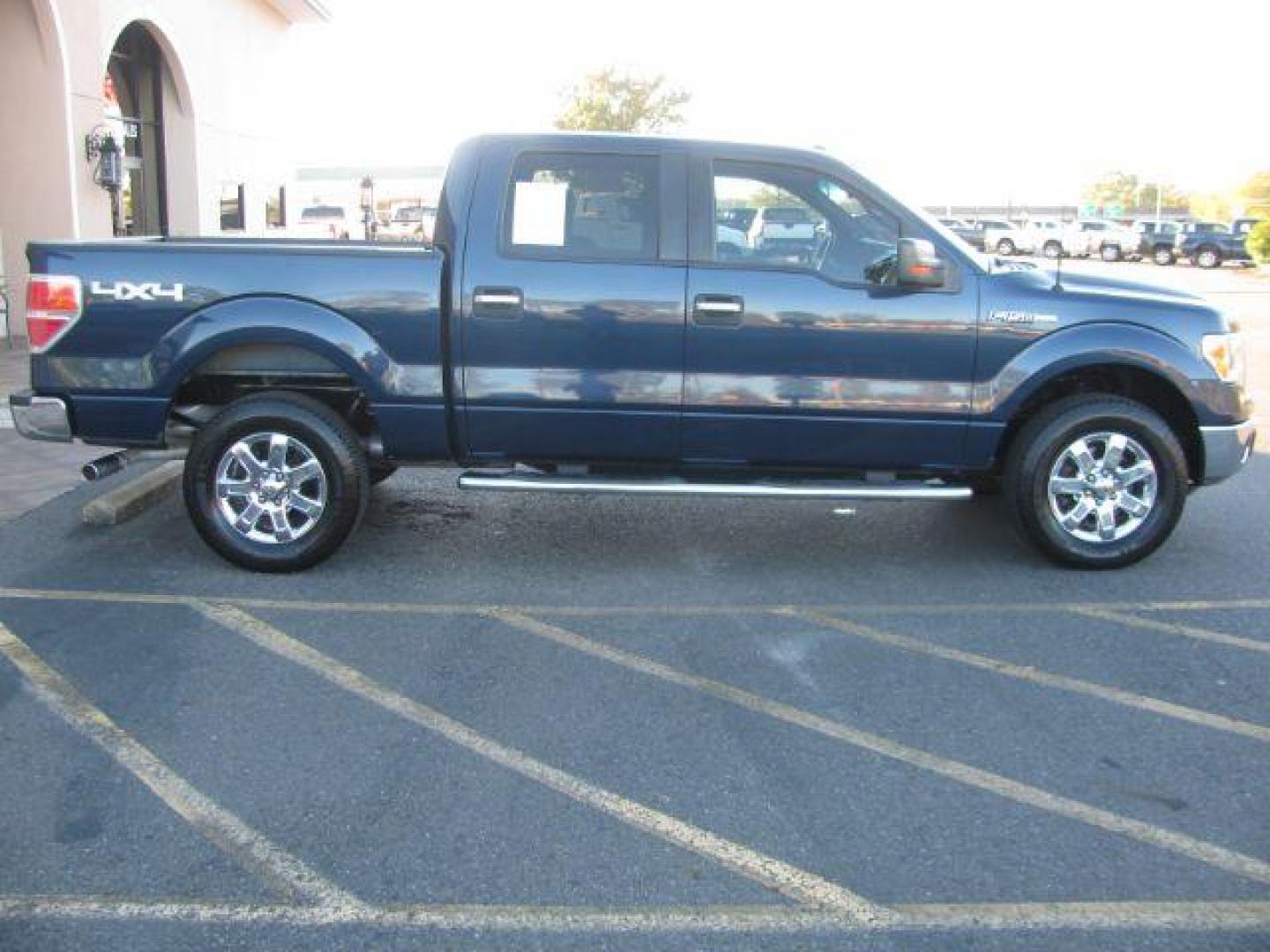 2013 Blue Ford F-150 XLT SuperCrew 5.5-ft. Bed 4WD (1FTFW1EF6DK) with an 5.0L V8 engine, 6-Speed Automatic transmission, located at 2443 Albert Pike, Hot Springs, AR, 71913, (501) 623-6255, 34.492222, -93.109993 - Photo#5