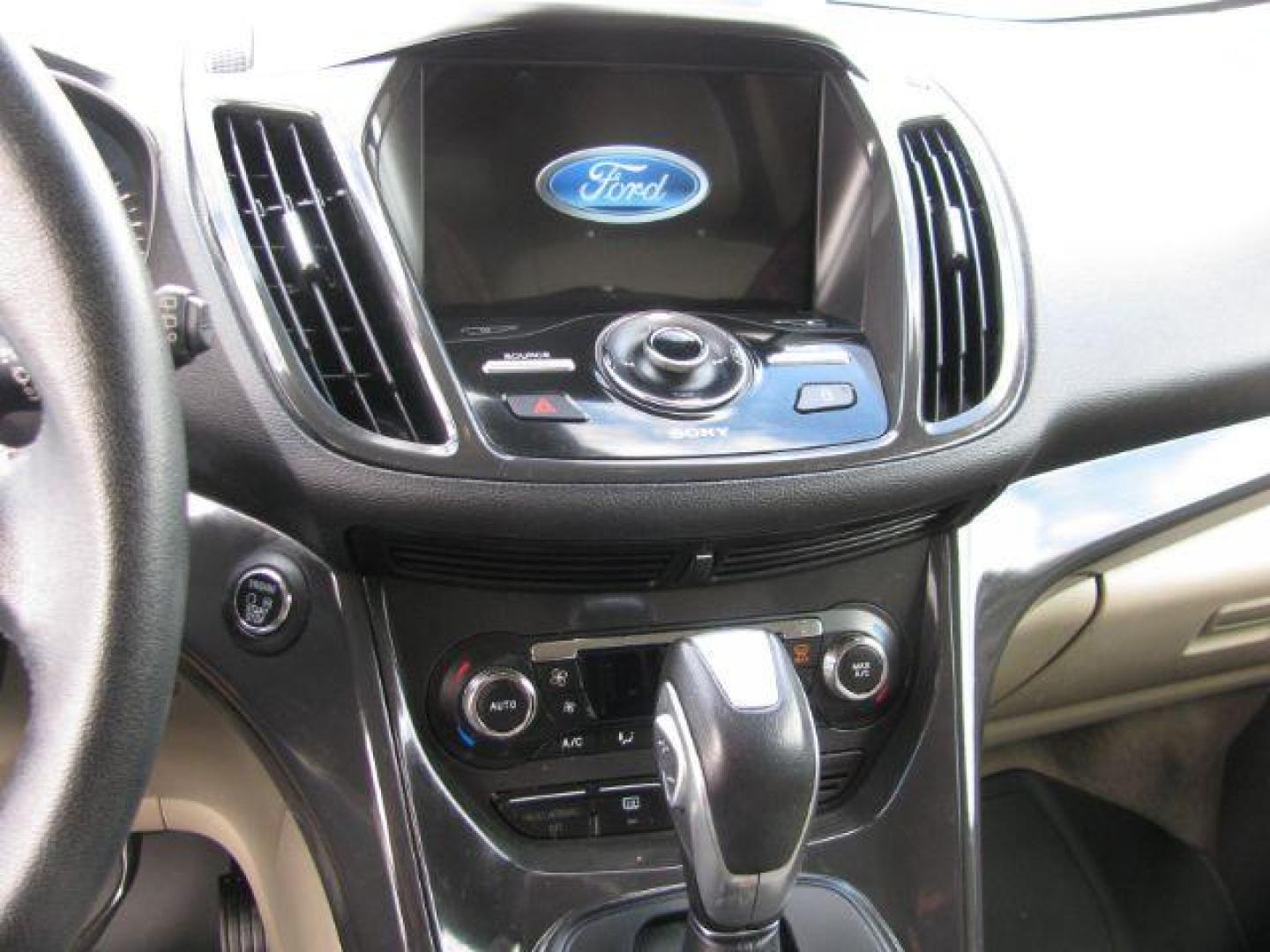 2016 Gray Ford Escape Titanium FWD (1FMCU0J99GU) with an 2.0L L4 DOHC 16V engine, 6-Speed Automatic transmission, located at 2443 Albert Pike, Hot Springs, AR, 71913, (501) 623-6255, 34.492222, -93.109993 - Photo#9