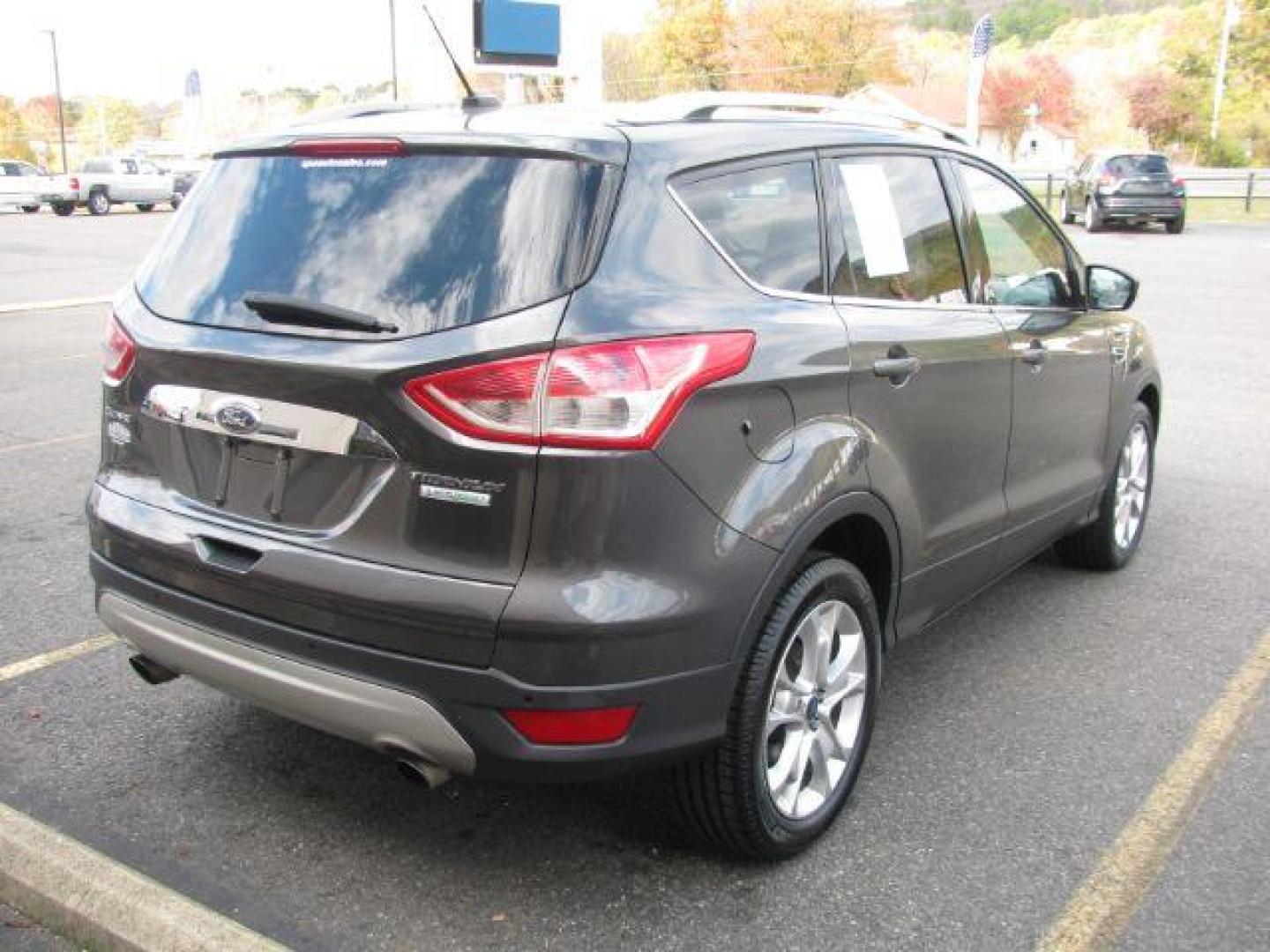 2016 Gray Ford Escape Titanium FWD (1FMCU0J99GU) with an 2.0L L4 DOHC 16V engine, 6-Speed Automatic transmission, located at 2443 Albert Pike, Hot Springs, AR, 71913, (501) 623-6255, 34.492222, -93.109993 - Photo#3