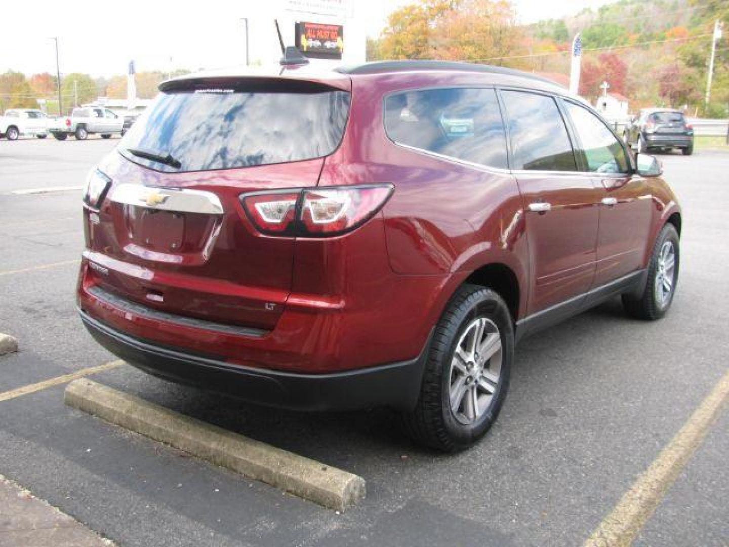 2017 Maroon Chevrolet Traverse 2LT FWD (1GNKRHKD8HJ) with an 3.6L V6 DOHC 24V engine, 6-Speed Automatic transmission, located at 2443 Albert Pike, Hot Springs, AR, 71913, (501) 623-6255, 34.492222, -93.109993 - Photo#3