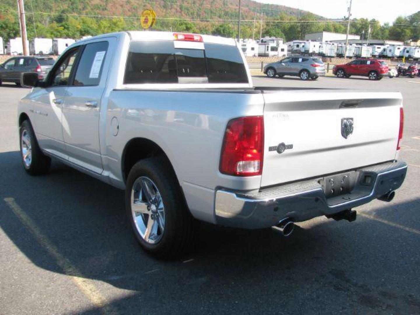 2011 Silver RAM 1500 SLT Crew Cab 2WD (1D7RB1CT7BS) with an 5.7L V8 OHV 16V engine, 5-Speed Automatic transmission, located at 2443 Albert Pike, Hot Springs, AR, 71913, (501) 623-6255, 34.492222, -93.109993 - Photo#4