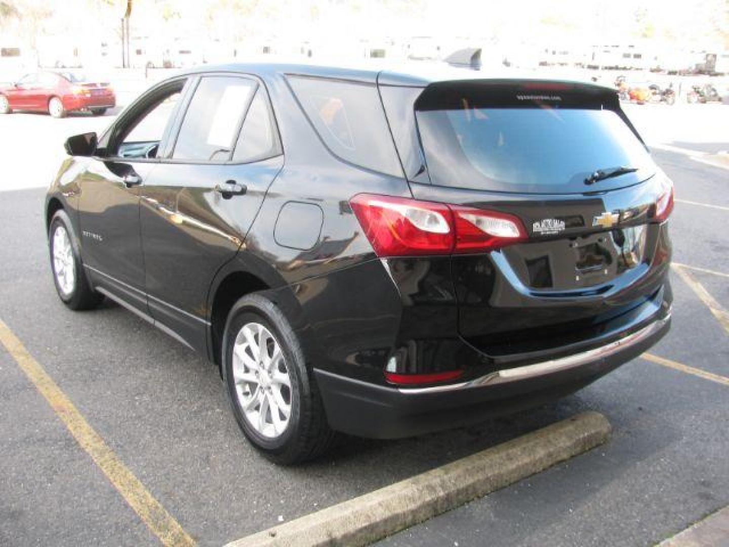 2018 Black Chevrolet Equinox LS 2WD (2GNAXHEV7J6) with an 1.5L L4 DIR DOHC 16V TURBO engine, 6-Speed Automatic transmission, located at 2443 Albert Pike, Hot Springs, AR, 71913, (501) 623-6255, 34.492222, -93.109993 - Photo#2