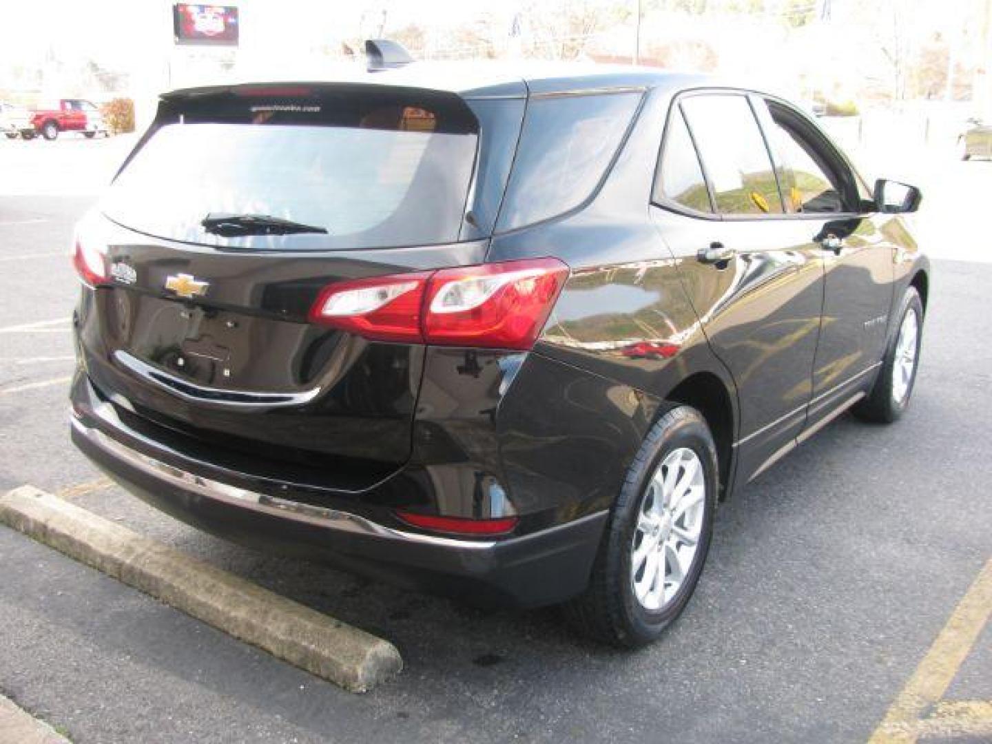 2018 Black Chevrolet Equinox LS 2WD (2GNAXHEV7J6) with an 1.5L L4 DIR DOHC 16V TURBO engine, 6-Speed Automatic transmission, located at 2443 Albert Pike, Hot Springs, AR, 71913, (501) 623-6255, 34.492222, -93.109993 - Photo#3