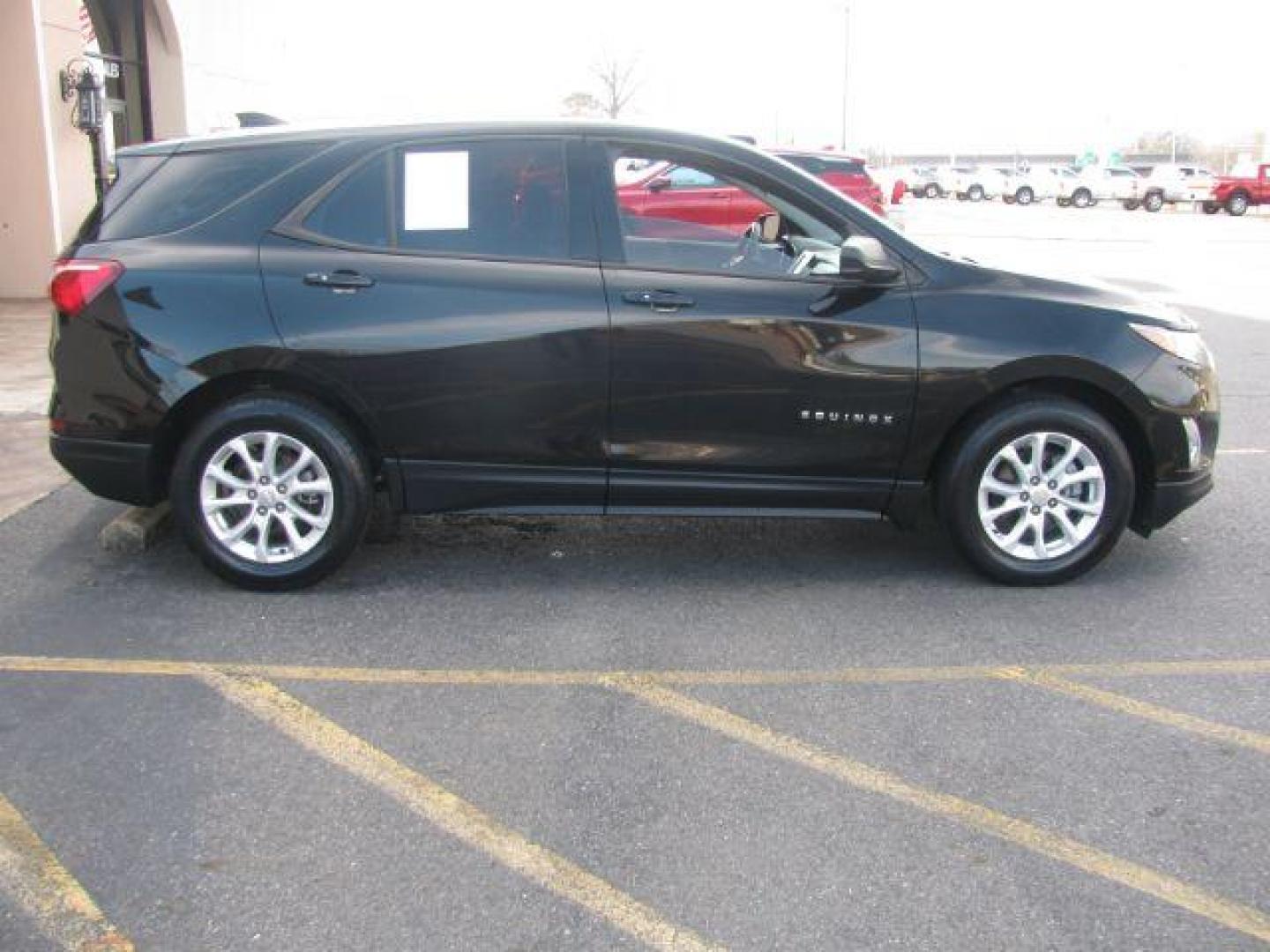 2018 Black Chevrolet Equinox LS 2WD (2GNAXHEV7J6) with an 1.5L L4 DIR DOHC 16V TURBO engine, 6-Speed Automatic transmission, located at 2443 Albert Pike, Hot Springs, AR, 71913, (501) 623-6255, 34.492222, -93.109993 - Photo#4