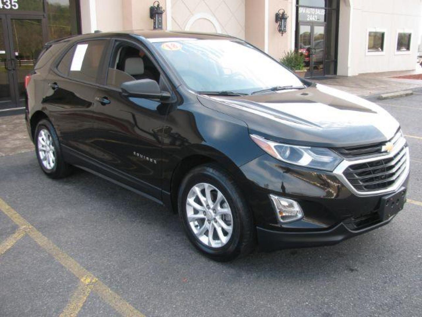 2018 Black Chevrolet Equinox LS 2WD (2GNAXHEV7J6) with an 1.5L L4 DIR DOHC 16V TURBO engine, 6-Speed Automatic transmission, located at 2443 Albert Pike, Hot Springs, AR, 71913, (501) 623-6255, 34.492222, -93.109993 - Photo#5