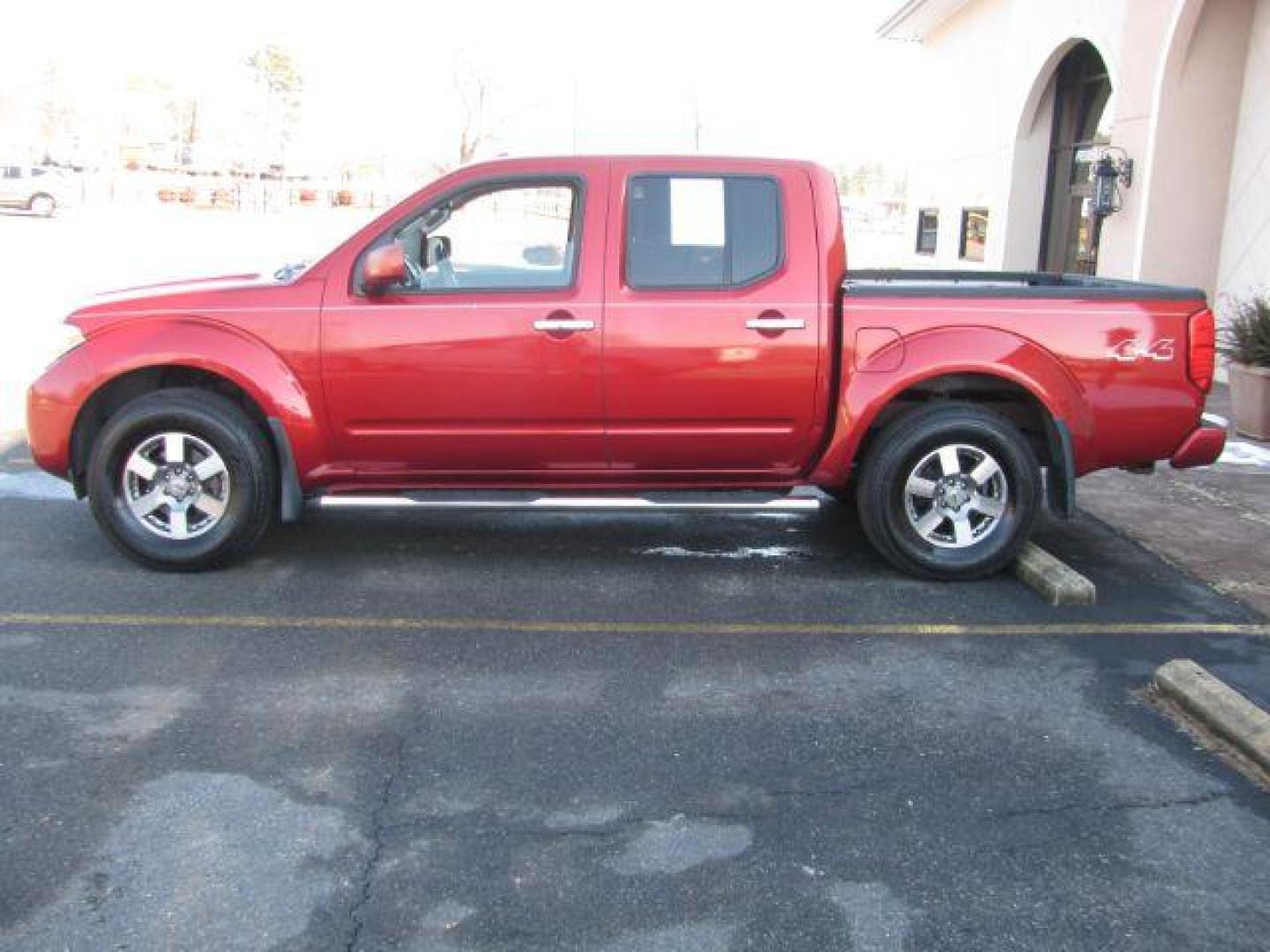 2012 Red Nissan Frontier PRO-4X Crew Cab 4WD (1N6AD0EV9CC) with an 4.0L V6 DOHC 24V engine, 5-Speed Automatic transmission, located at 2443 Albert Pike, Hot Springs, AR, 71913, (501) 623-6255, 34.492222, -93.109993 - Photo#1