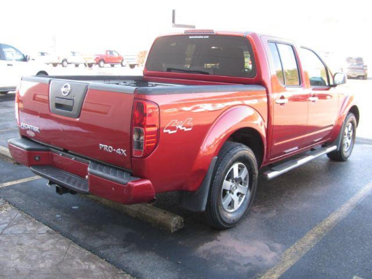 2012 Red Nissan Frontier PRO-4X Crew Cab 4WD (1N6AD0EV9CC) with an 4.0L V6 DOHC 24V engine, 5-Speed Automatic transmission, located at 2443 Albert Pike, Hot Springs, AR, 71913, (501) 623-6255, 34.492222, -93.109993 - Photo#4