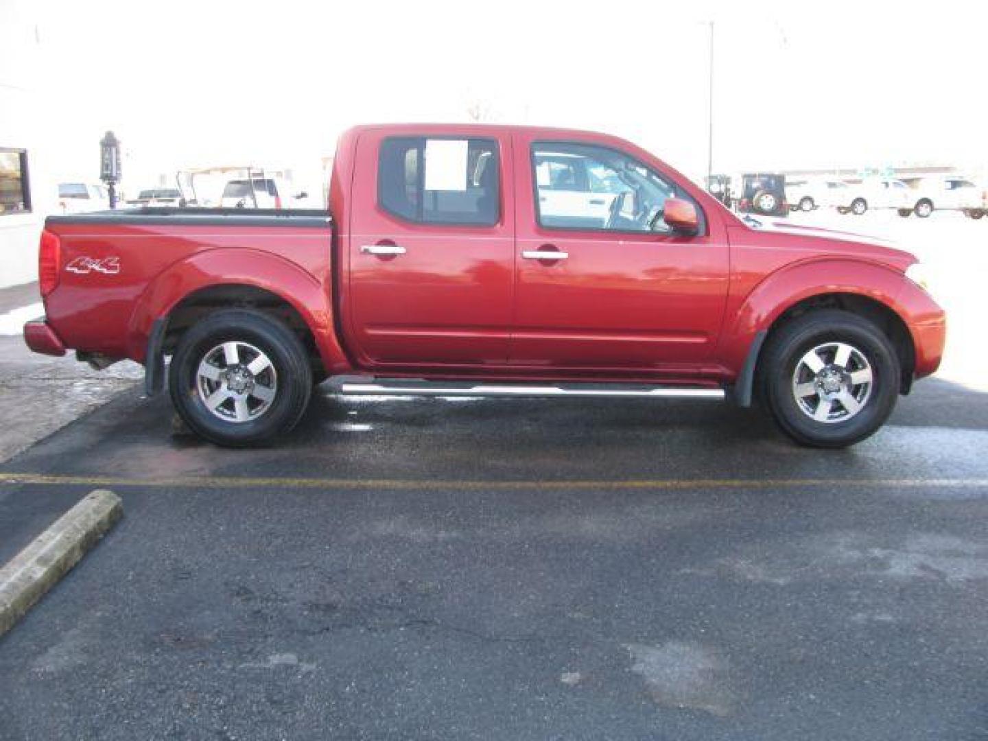 2012 Red Nissan Frontier PRO-4X Crew Cab 4WD (1N6AD0EV9CC) with an 4.0L V6 DOHC 24V engine, 5-Speed Automatic transmission, located at 2443 Albert Pike, Hot Springs, AR, 71913, (501) 623-6255, 34.492222, -93.109993 - Photo#5