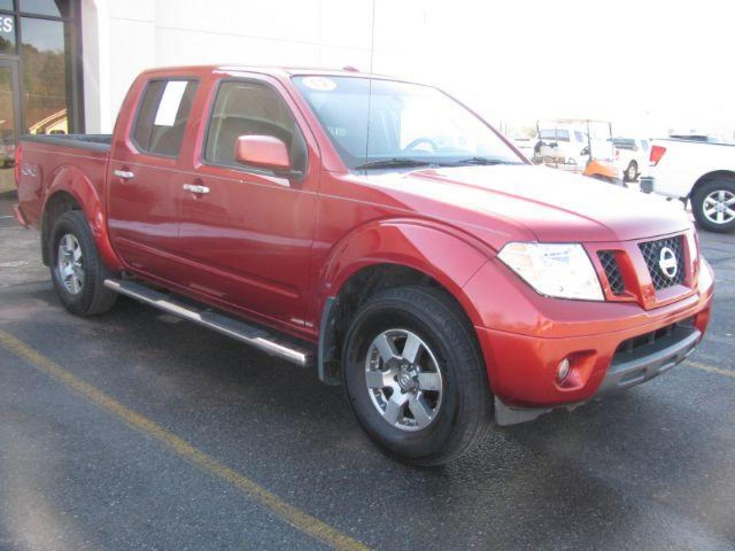 2012 Red Nissan Frontier PRO-4X Crew Cab 4WD (1N6AD0EV9CC) with an 4.0L V6 DOHC 24V engine, 5-Speed Automatic transmission, located at 2443 Albert Pike, Hot Springs, AR, 71913, (501) 623-6255, 34.492222, -93.109993 - Photo#6