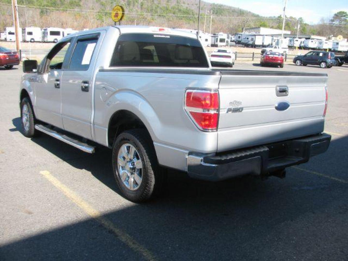 2010 Silver Ford F-150 XLT SuperCrew 5.5-ft. Bed 2WD (1FTEW1C82AF) with an 4.6L V8 SOHC 24V engine, located at 2443 Albert Pike, Hot Springs, AR, 71913, (501) 623-6255, 34.492222, -93.109993 - Photo#2