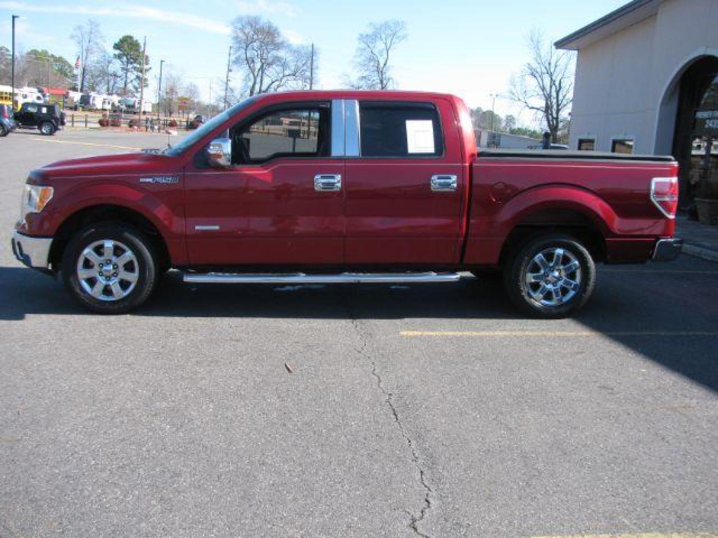 2013 Maroon Ford F-150 XLT SuperCrew 5.5-ft. Bed 2WD (1FTFW1CT9DK) with an 3.5L V6 TURBO engine, 6-Speed Automatic transmission, located at 2443 Albert Pike, Hot Springs, AR, 71913, (501) 623-6255, 34.492222, -93.109993 - Photo#1