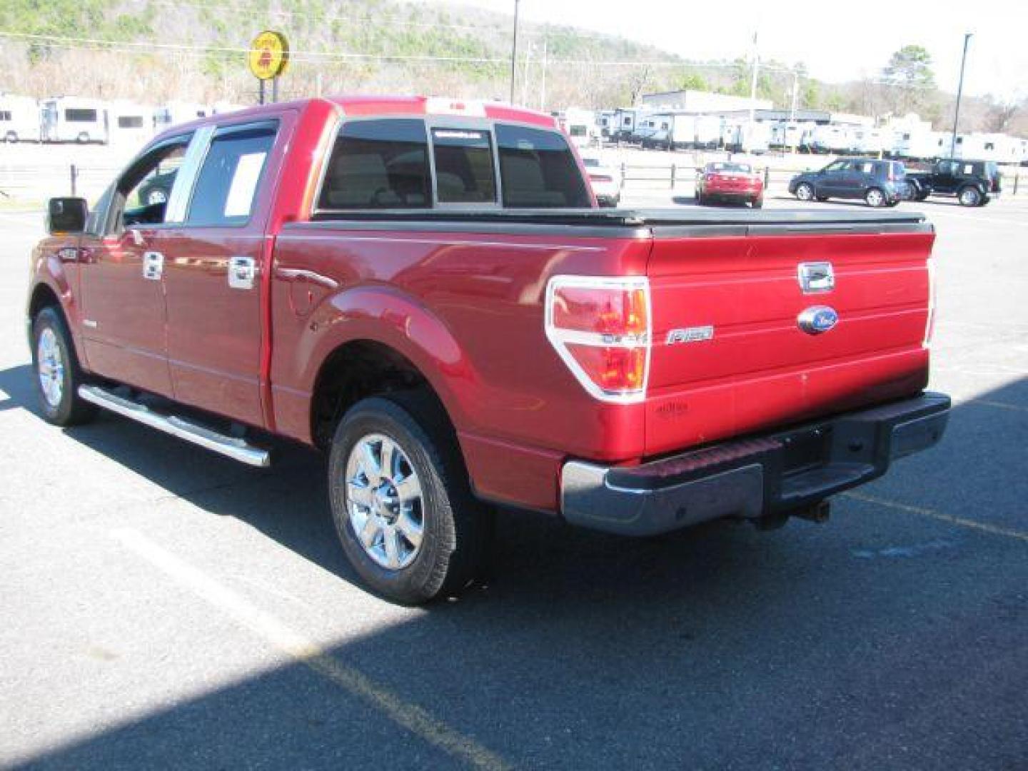 2013 Maroon Ford F-150 XLT SuperCrew 5.5-ft. Bed 2WD (1FTFW1CT9DK) with an 3.5L V6 TURBO engine, 6-Speed Automatic transmission, located at 2443 Albert Pike, Hot Springs, AR, 71913, (501) 623-6255, 34.492222, -93.109993 - Photo#2