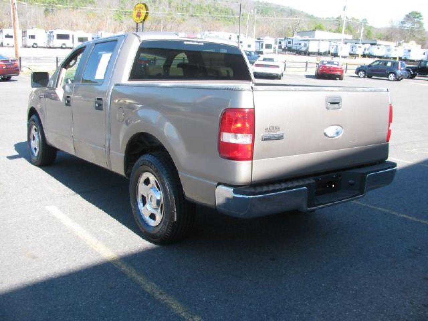 2006 Tan Ford F-150 XLT SuperCrew 2WD (1FTRW12W86K) with an 4.6L V8 SOHC 16V engine, 4-Speed Automatic transmission, located at 2443 Albert Pike, Hot Springs, AR, 71913, (501) 623-6255, 34.492222, -93.109993 - Photo#2