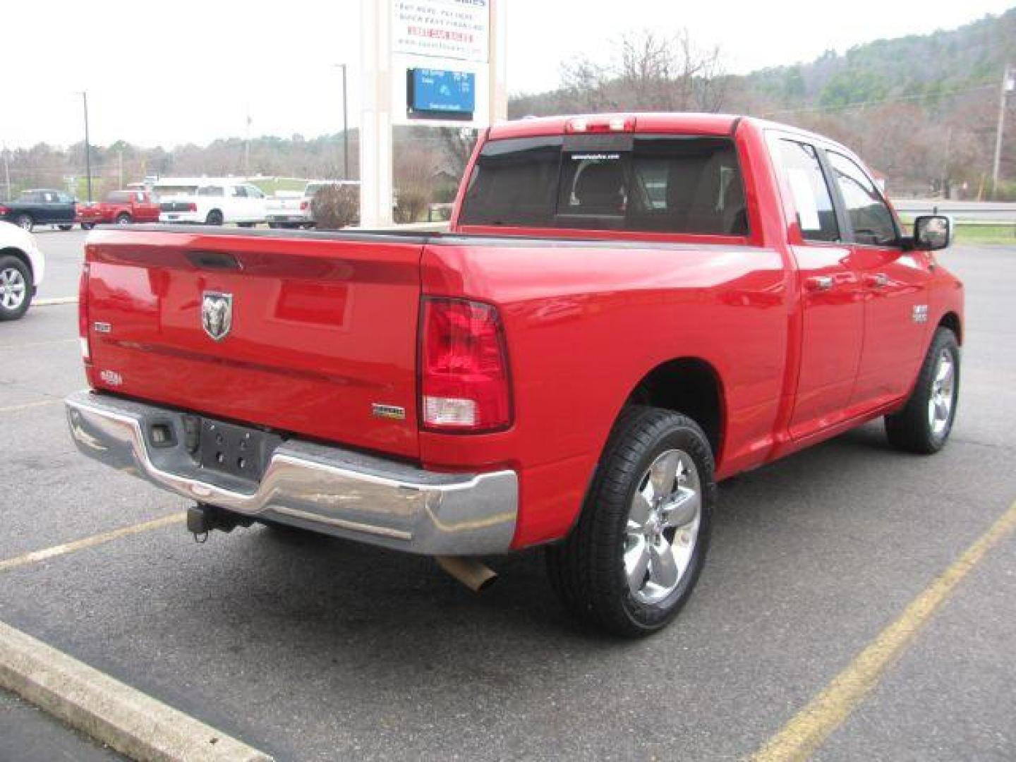 2017 Red RAM 1500 SLT Quad Cab 2WD (1C6RR6GG4HS) with an 3.6L V6 DOHC 24V FFV engine, 8-Speed Automatic transmission, located at 2443 Albert Pike, Hot Springs, AR, 71913, (501) 623-6255, 34.492222, -93.109993 - Photo#4