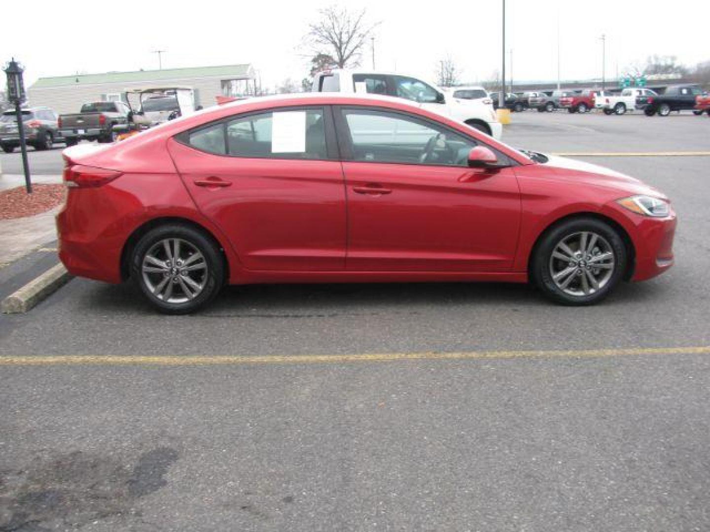 2017 Maroon Hyundai Elantra SE (5NPD84LF7HH) with an 2.0L engine, Auto transmission, located at 2443 Albert Pike, Hot Springs, AR, 71913, (501) 623-6255, 34.492222, -93.109993 - Photo#4