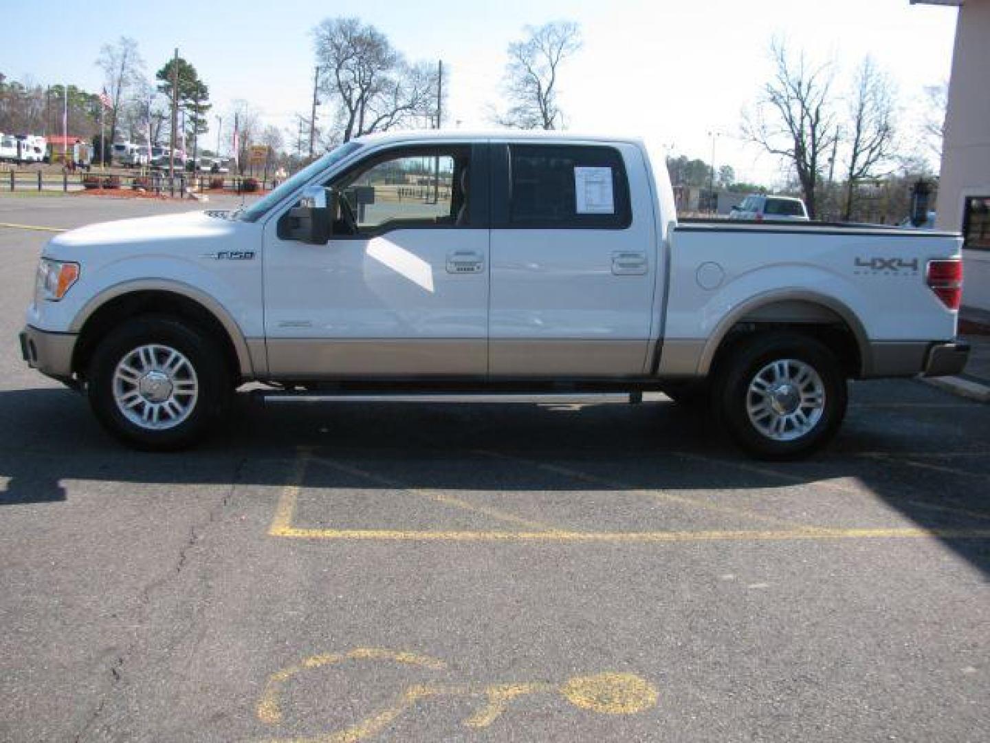 2012 White Ford F-150 Lariat SuperCrew 5.5-ft. Bed 4WD (1FTFW1ET9CF) with an 3.5L V6 TURBO engine, 6-Speed Automatic transmission, located at 2443 Albert Pike, Hot Springs, AR, 71913, (501) 623-6255, 34.492222, -93.109993 - Photo#1