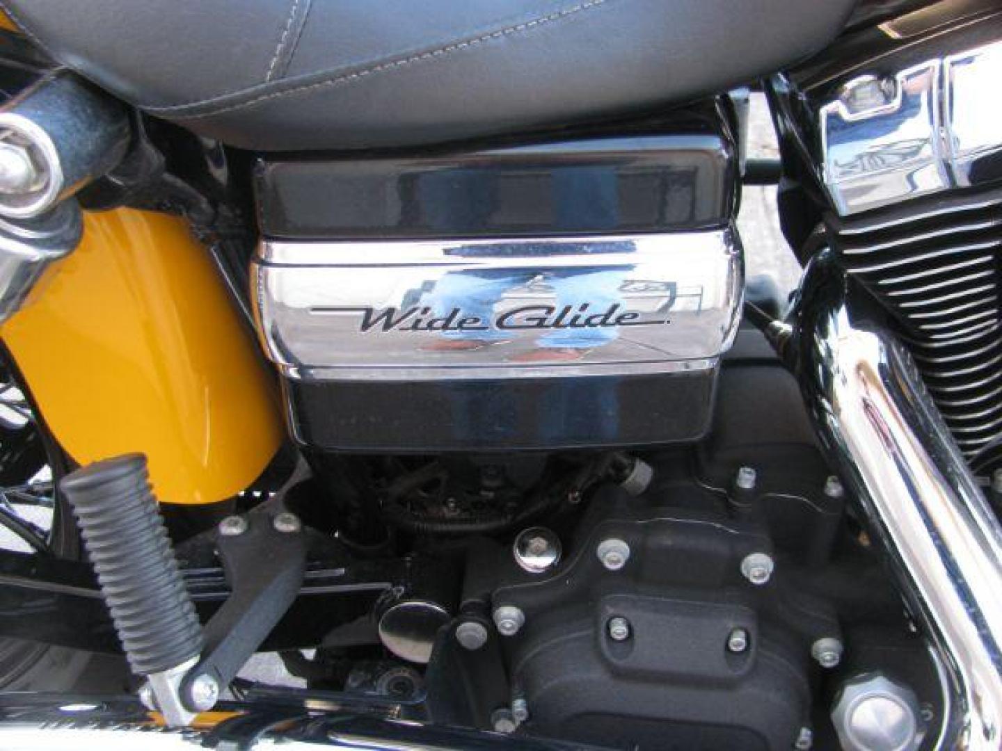 2011 Yellow Harley-Davidson Dyna Wide Glide Dyna Glide Wide (1HD1GP414BC) with an 1584CC engine, Manuel transmission, located at 2443 Albert Pike, Hot Springs, AR, 71913, (501) 623-6255, 34.492222, -93.109993 - Photo#5