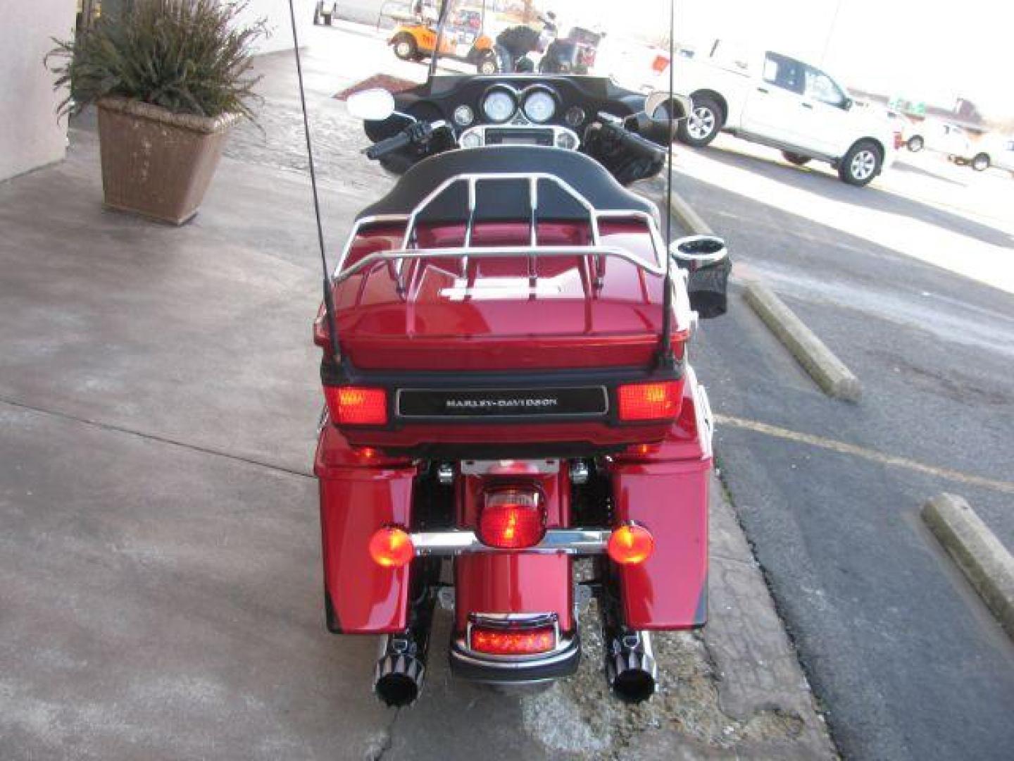 2012 Maroon Harley Davidson FLHTK Ultra (1HD1KEM12CB) with an 1690 CC engine, Manual transmission, located at 2443 Albert Pike, Hot Springs, AR, 71913, (501) 623-6255, 34.492222, -93.109993 - Photo#4