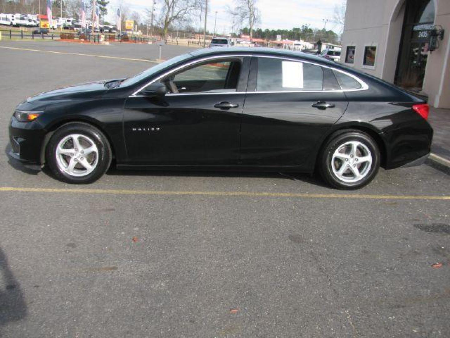 2016 Black Chev Malibu LS (1G1ZB5ST7GF) with an 1.5L engine, Auto transmission, located at 2443 Albert Pike, Hot Springs, AR, 71913, (501) 623-6255, 34.492222, -93.109993 - Photo#1